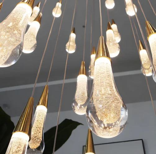 Lampadario moderno in cristallo a spirale rotonda con gocce di pioggia a cascata per scale/ingresso