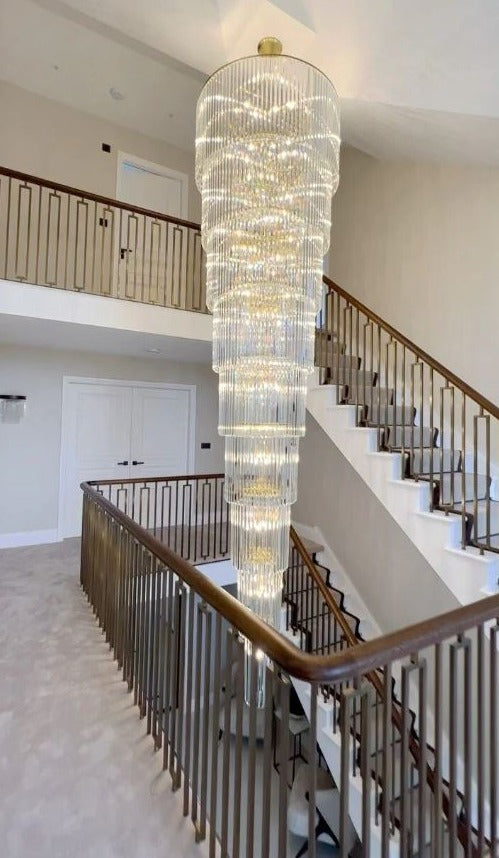 European style modern simple crystal chandelier for villa living room, between the rotating ladder.