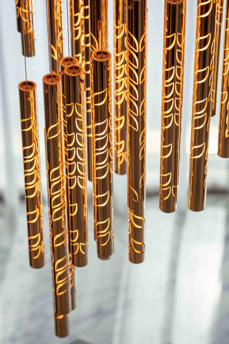 Lustre en tube de verre inspiré des feuilles flottantes, design d'art moderne, pour plafond haut