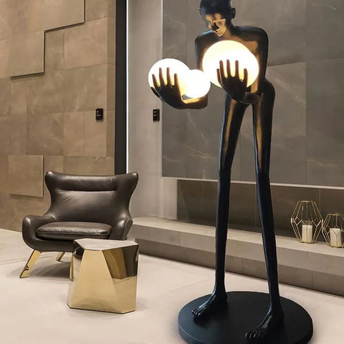 Human Sculpture Hugging Ball Floor Lamp