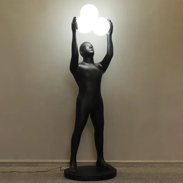 Lampada da terra con statua porta luce nera