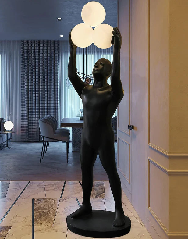 Lampada da terra con statua porta luce nera