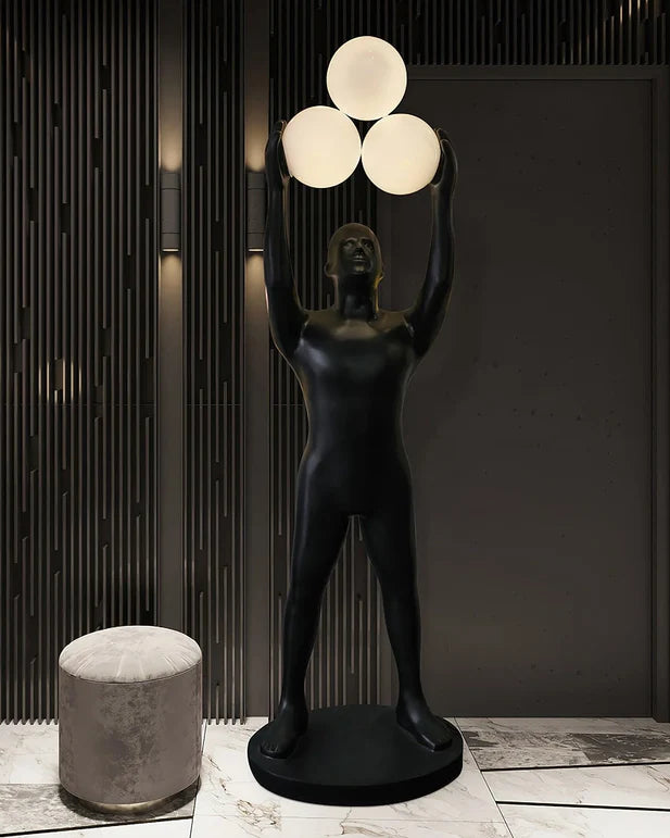 Lampada da terra con statua porta luce nera