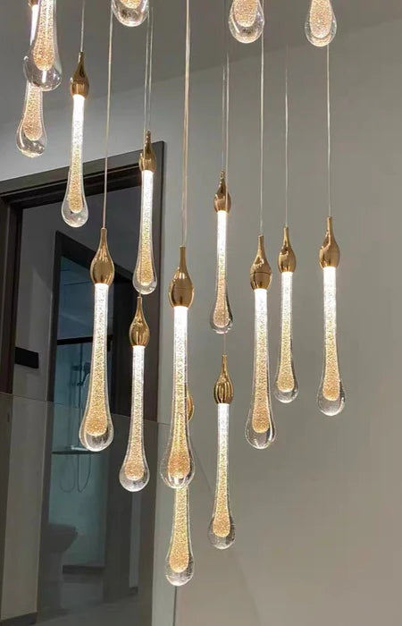 Lampadario a sospensione con gocce di vetro per atrio, lampadario a chiocciola per soffitto alto, finitura oro