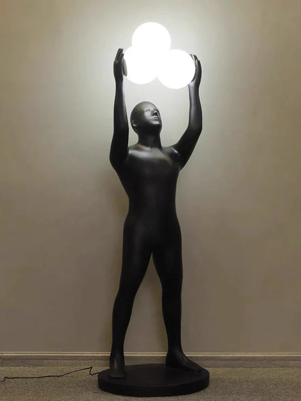 Lampada da terra con statua porta luce nera