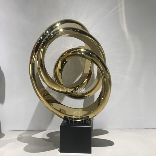 Scultura artistica ispirata al vortice in acciaio inossidabile placcato oro