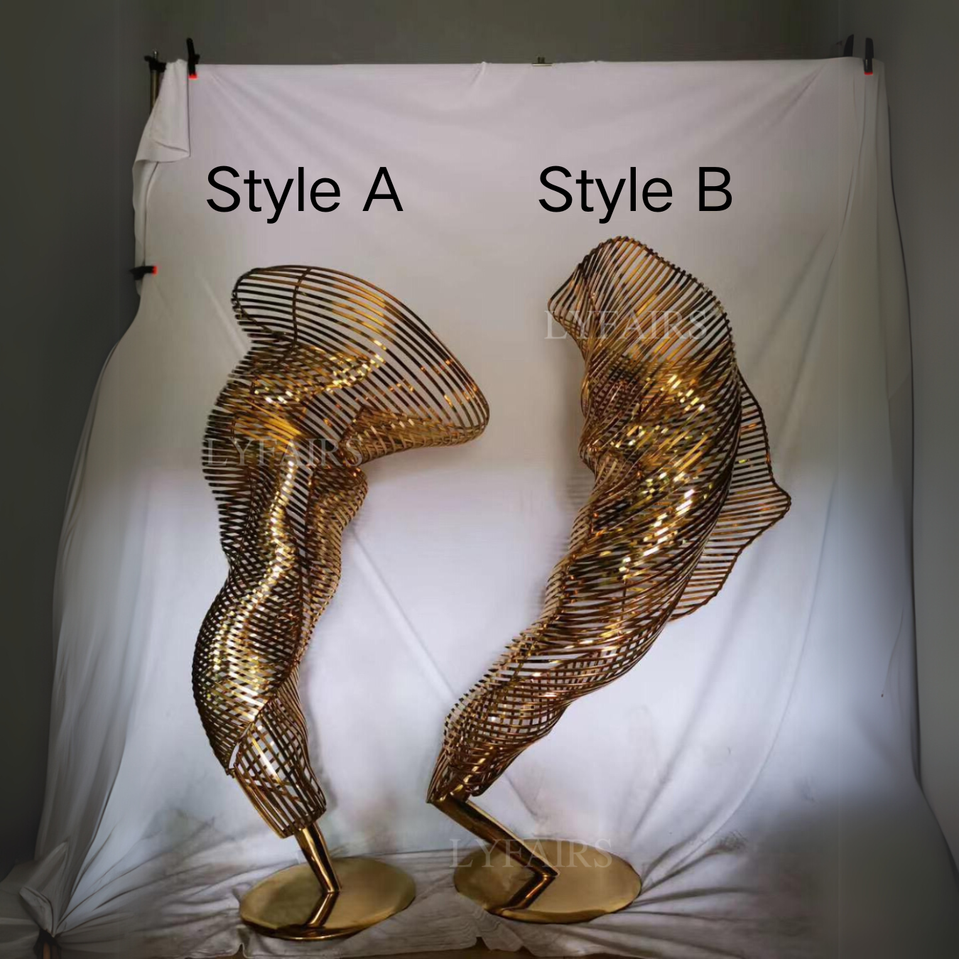 Sculpture de chef-d'œuvre en acier inoxydable doré à tourbillon rotatif