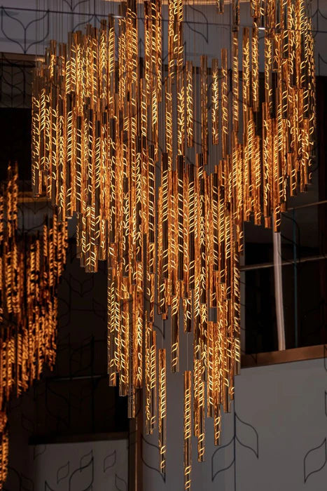 Lustre en tube de verre inspiré des feuilles flottantes, design d'art moderne, pour plafond haut