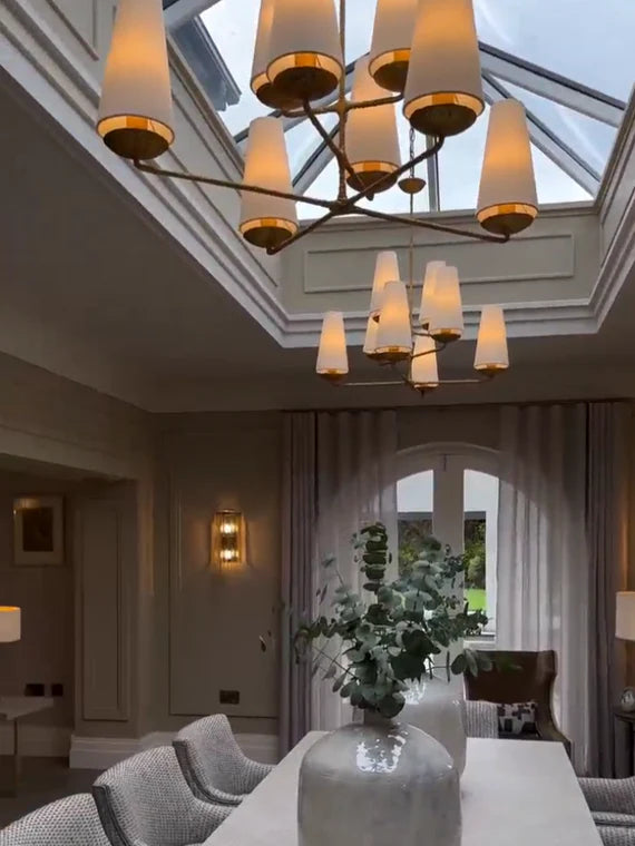 Lampadario verticale in finitura bronzo/nero/bianco