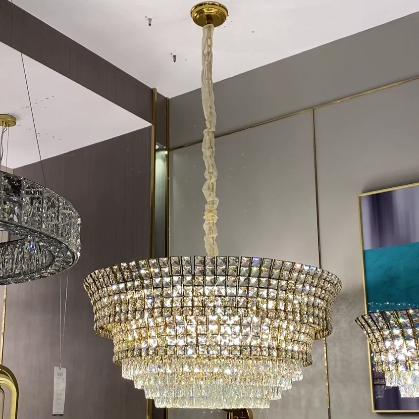 Nouveau lustre en cristal créatif de luxe à plusieurs niveaux avec finition or champagne pour salon/salle à manger/escalier/hall d'entrée