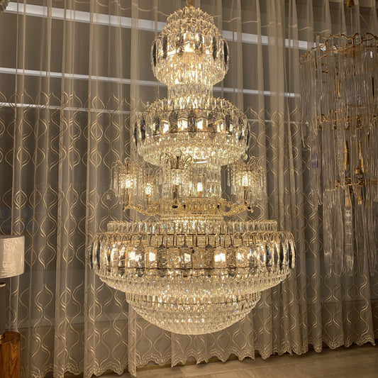 chandelier,chaandeliers,pendant,crystal,metal,gold,luxury,empire,ceiling,tiers,layers,multi-tier,extra large,oversized,large,huge,big,living room,dining room,high-ceiling room,foyer,stairs,hallway,entryance,hotel lobby,duplex hall,loft