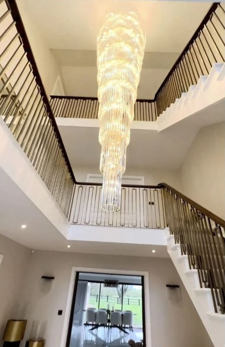 European style modern simple crystal chandelier for villa living room, between the rotating ladder.
