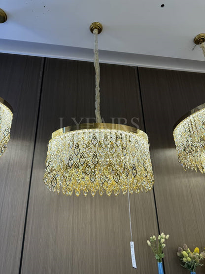 Lustre rond élégant en cristal avec pampilles dorées pour plafonds bas