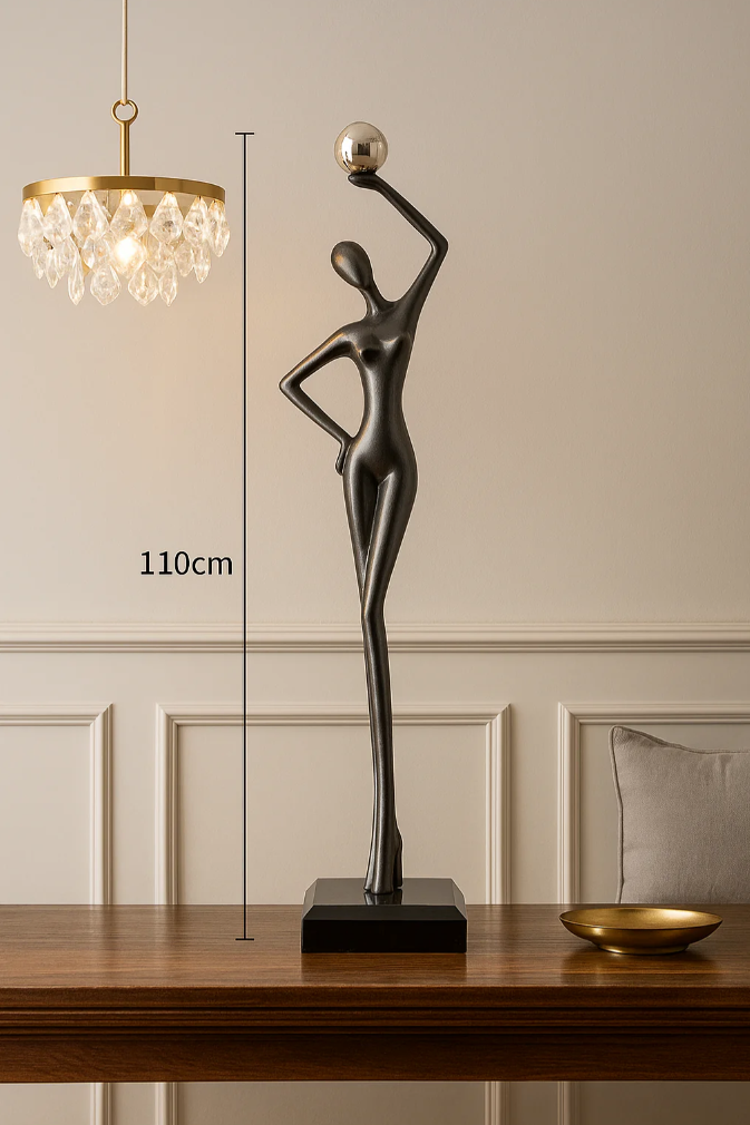Sleek Abstract Female Statue with a Silver Orb in Hand
