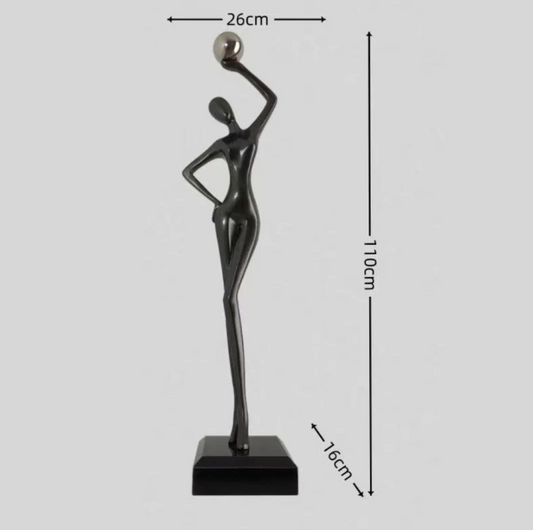 Sleek Abstract Female Statue with a Silver Orb in Hand