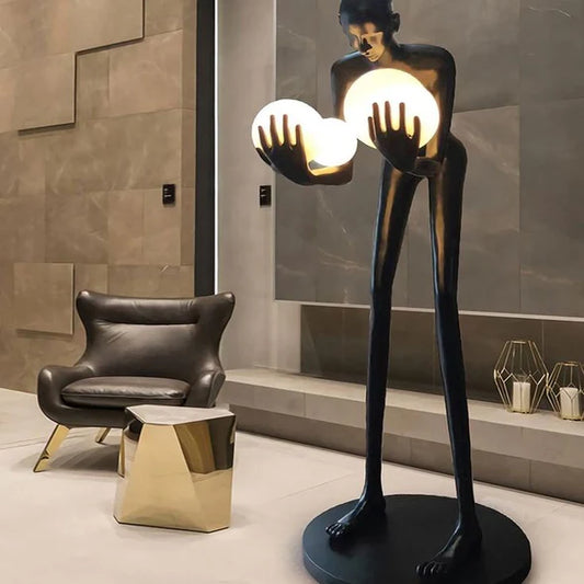 Human Sculpture Hugging Ball Floor Lamp