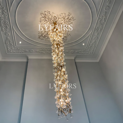Nature-inspired Brass Tree Chandelier with Glazed Glass Flowers