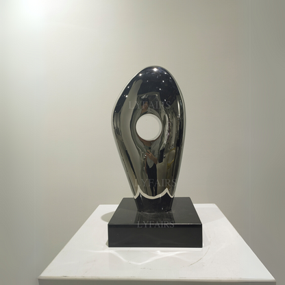 Scultura ovale cava metallica astratta moderna
