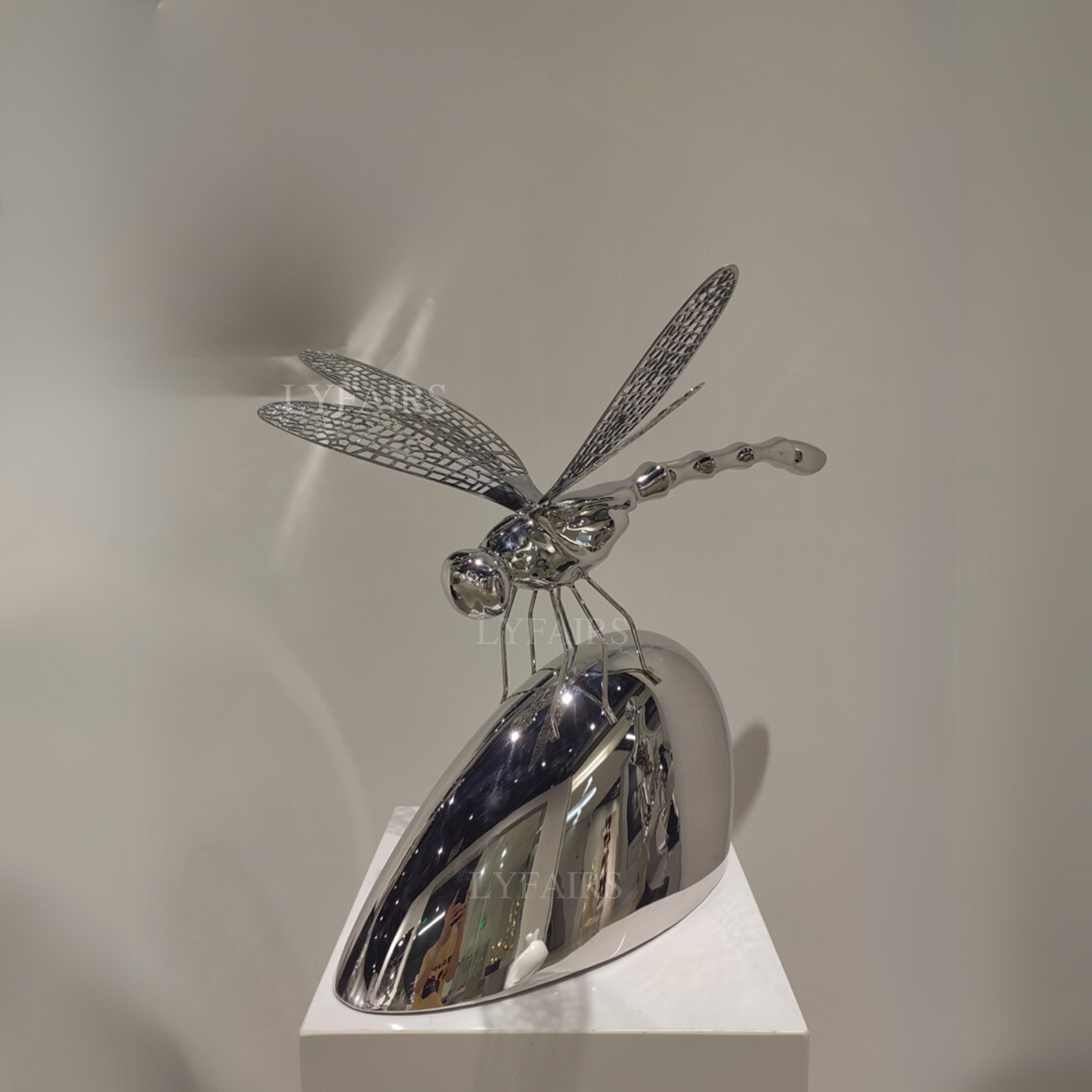 Dragonfly Rests on Stone Crafted in Premium Stainless Steel Sculpture