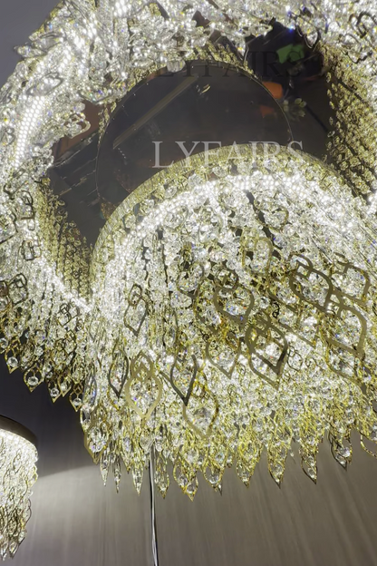 Lustre rond élégant en cristal avec pampilles dorées pour plafonds bas