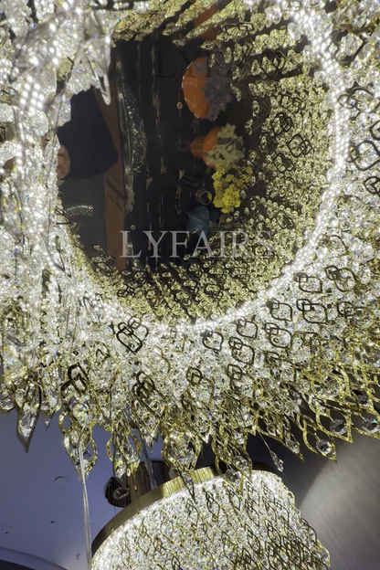 Lustre rond élégant en cristal avec pampilles dorées pour plafonds bas