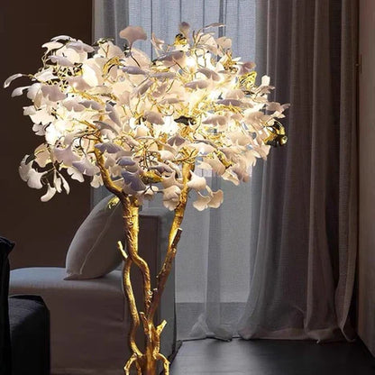 Lampadaire de luxe créatif en céramique blanche, motif branche de Ginkgo Biloba en cuivre, design artistique, idéal pour un salon, une chambre ou un dressing.