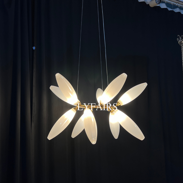 Lustre en fer minimaliste en forme de grain de riz pour salle à manger