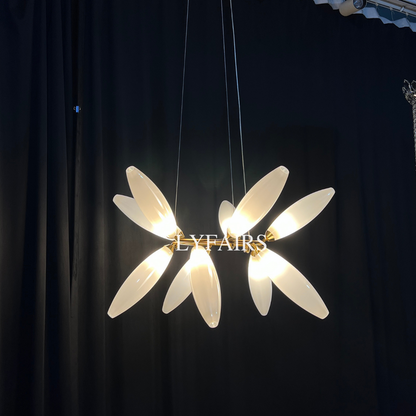Lustre en fer minimaliste en forme de grain de riz pour salle à manger