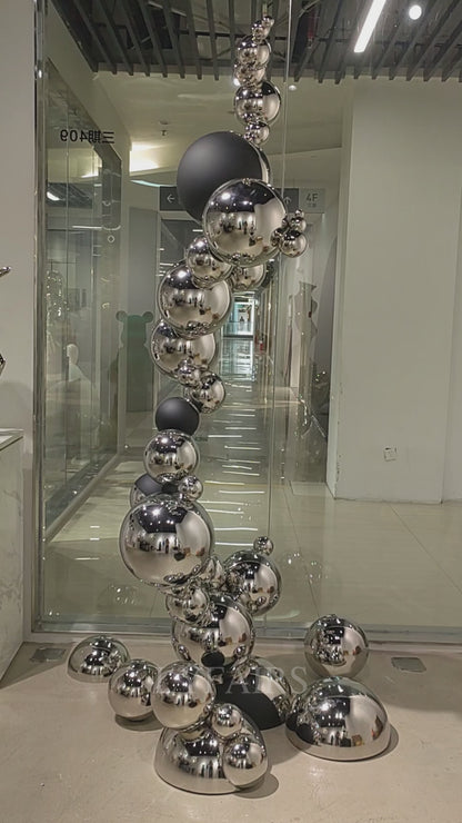 Sculptural Symphony of Floating Spheres in Polished Silver Elegance