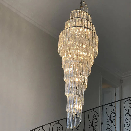 chandelier,chandeliers,pendant,crystal,metal,gold,chrome,spiral,stairs,extra large,extra long,oversized,large,huge,big,long,foyer,high-ceiling room,hotel lobby,living room,loft